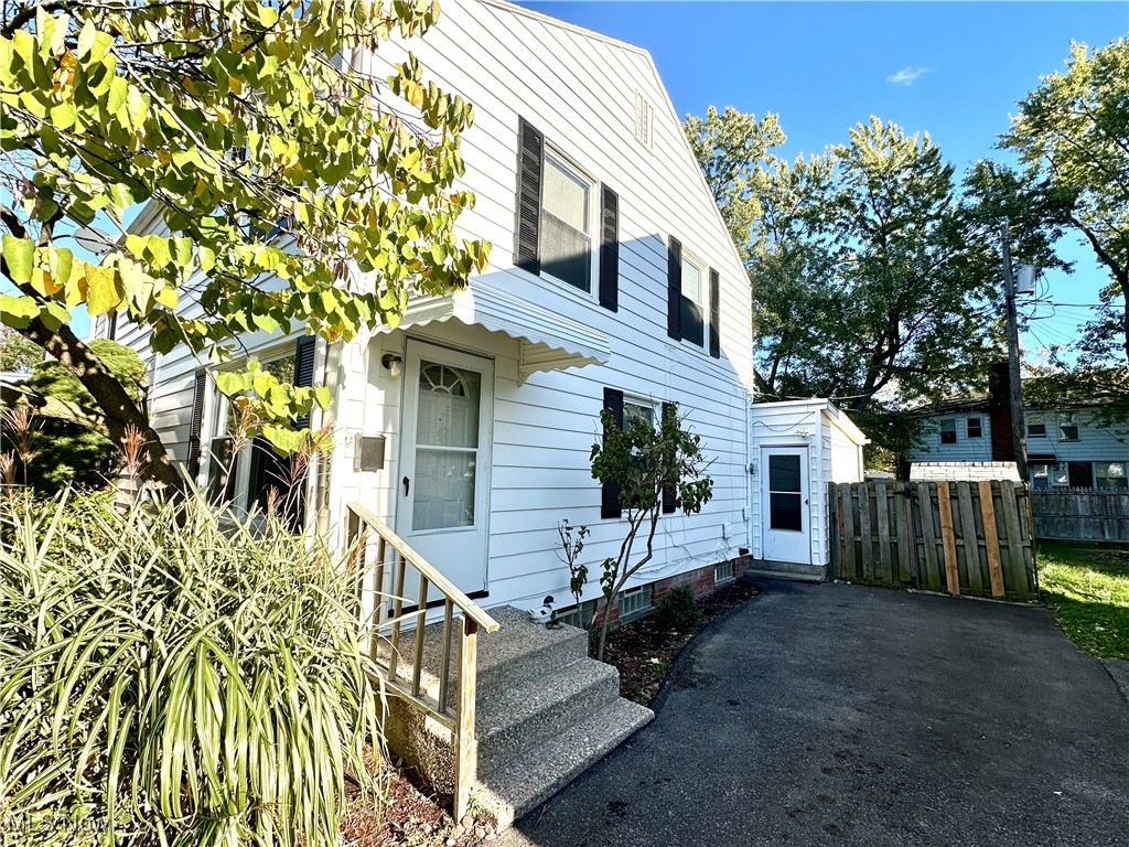 Welcome to this freshly painted (exterior), City of Euclid violation-free home — perfect for a first-time buyer or a turn-key investor. The main floor features a comfortable living room with an adjoining dining area and a small bonus room that provides great flex space for an office, playroom, or makeshift bedroom. Upstairs, you’ll find two bedrooms and a full bathroom, offering a cozy and functional layout.   The basement offers extra space with a partially finished area, ideal for storage or future finishing potential.  The utility side contains the homes mechanicals and is set up for laundry.
The home has seen plenty of attention in recent weeks, with fresh updates and thoughtful touches to make it shine for its new owner.  This includes a fresh coat of paint of the exterior siding and shutters, landscaping in the backyard and freshly poured concrete on the driveway apron.  Other improvements over the years include an updated electrical panel, furnace (2016), and hot water tank (2018). 
Outside, enjoy mature landscaping, a fenced-in backyard, concrete patio, and a storage shed for added convenience. Located close to major employers like Amazon Fulfillment Center and Lincoln Electric, with easy access to Euclid Avenue shopping and dining, the Euclid Dog Park, and quick freeway connections to I-90, Route 2, and 271 South.
This home is ready for its next chapter—schedule your showing today!   Some photos have been virtually staged for inspiration.