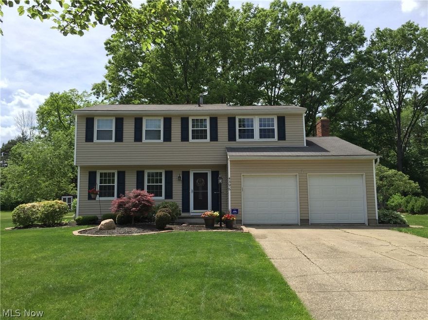 Sharp Colonial on beautiful lot in desirable Stow neighborhood.  Nicely updated and very well maintained.  Formal living and dining, beautiful kitchen with cherry cabinets, stainless appliances, island breakfast bar all open to cozy family room w/fireplace and built in shelves & beautiful floors.  Four bedrooms up plus a rec room and office in the lower level.  Fabulous lot overlooks wooded area.  Paved patio and fire pit too!  Updated furnace, AC, and windows since 2010.  Don't miss this one!