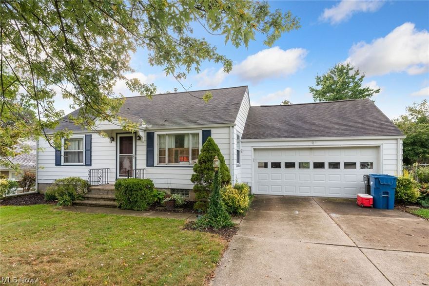 Welcome to this 1957 Cape Cod style home. The front exterior of the property has a paved driveway that leads to the attached garage. This property has had updates such as a new furnace and hot water tank, both in 2021. Step inside and be welcomed by the spacious living room with an arched doorway that leads to the eat-in kitchen featuring plenty of original wooden cabinetry, perfect for storage. The 2 bedrooms have the original wood floors and share an updated bathroom with a shower/tub combo, tiled floors, and linen closet. Start your day off right in the bright rear facing sunroom. Downstairs is the partially finished basement with freshly painted walls and new flooring that has a dry bar and game room. Outside in the fully fenced in backyard is the above ground pool with wooden deck. Schedule your showing today!