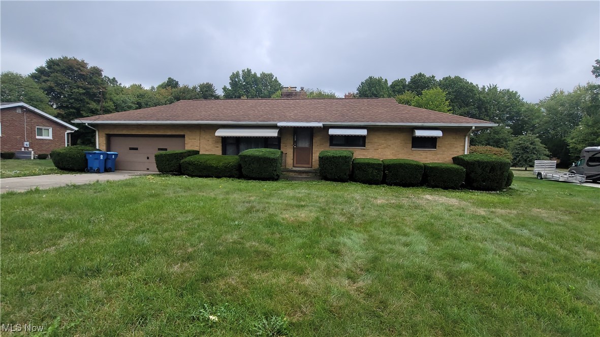 Welcome home to 987 Homeland Drive! This clean, well maintained all brick ranch has 3 bedrooms, 1 bathroom, and sits on just under a half acre on a quiet street. A full, basement provides many possibilities for recreation and additional entertaining. The three season, enclosed patio adds additional living space and provides the perfect view of the private back yard! Fireplace too! Manchester LSD! Minutes from Portage Lakes State Parks, shopping and dining! Call for your showing today!