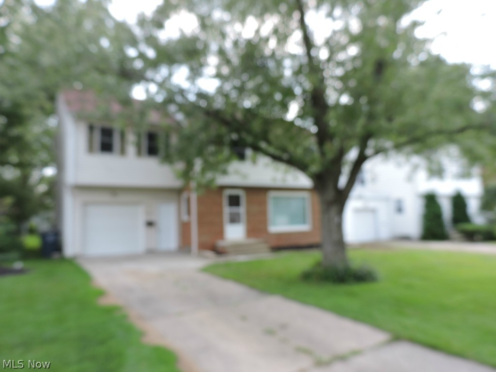 YOU HAVE TO SEE THIS HOME! This ready to move into home offers that the whole inside has been freshly painted in neutral color, new carpet throughout the entire house, all new cabinets, granite counter tops, sink and wood laminate floor in the kitchen. A large maser bedroom with vaulted ceilings, large walk in closest and master bath. The roof, hot water tank, furnace and ac are new in 2013. A fenced in backyard with a shed, a 3 season room opening out to the large backyard. A quiet, friendly neighborhood! This house is ready for you to move in and call it Home!