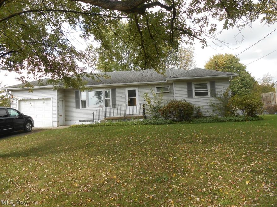 Three Bedroom Vinyl Ranch. Freshly painted, new carpet in the living room and hallway.  All 3 bedrooms have refinished hardwood floors. New bath vanity and fixtures. Full basement with a half bath.  Roof is 10 years old. Close to schools and shopping