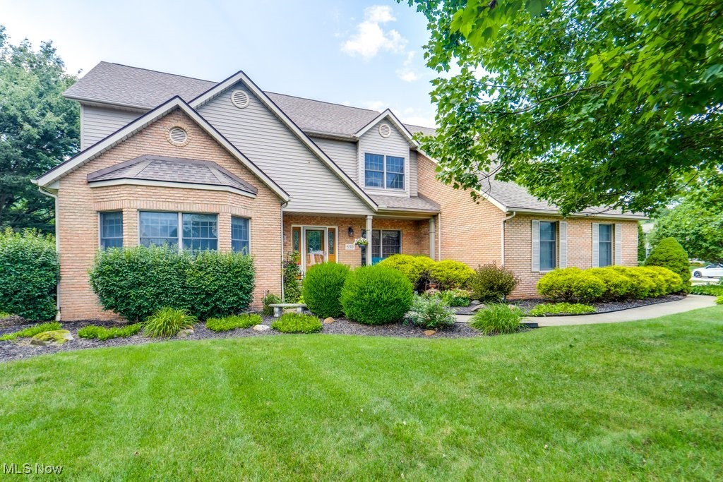 Beautiful home in Ridgewood Lakes with a bright, open layout and generous room sizes. The impressive two-story entry flows into elegant formal living and dining areas. The vaulted great room features a striking brick fireplace framed by arched windows. The updated kitchen boasts stainless steel appliances, wall of built-in pantry storage, a peninsula for seating, and a casual dining space. Come enjoy the inviting sunroom overlooking the large yard and patio. Perfect for entertaining! The first-floor owner’s suite includes a renovated master bath with a luxurious walk in shower. First floor also features a room with laundry hookups and a half bath. Upstairs offers 3 sizable bedrooms (one with private bath), a full hall bath, and a cedar walk-in closet. The finished lower level adds 1,500 sq ft with a full bath, bedroom with egress, and extra storage and optional laundry. This house is completed with a 3 car garage. This is one you won’t want to miss!