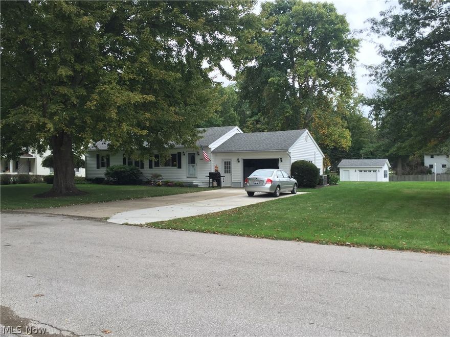 Beautiful Home in every way. Oak kitchen cabinets with ceramic flooring, beautiful colors, and entry from the garage
and basement. Large LR features oak trim , and large window looking out to the front yard. 3 comfortable bedrooms all
with carpeting and fans for perfect comfort. New windows all around, oak trim all around, and kitchen with lots of
beautiful Kraft Maid cupboards.  Striking comfortable All-Season Sunroom with 7 glass doors creating a  bright
cheerful room that has HOT Water heat in the floor and a ventless gas fireplace  for extra warmth in cooler times.  The
sunroom overlooks a beautiful double lot  and an additional 20  x 20 garage in the back yard for all of the mowers,
extra equipment and toys you have.   A partial finished basement,  Laundry room and storage along with the  efficient
updated gas boiler furnace and hot water tank. Laundry has gas hookup for dryer.  Updated electrical with 100 amp
service all in the lower basement level. The yard has a beautif