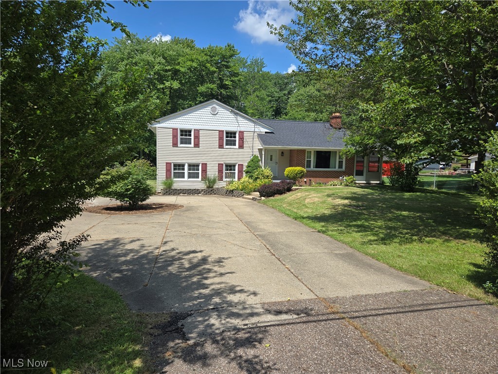 This wonderful split-level home in Copley has everything you need to thrive! A wonderful lightly wooded back yard with a fire pit, deck to enjoy the outdoors, and a wonderful view of nature. The wood burning fire place in the living room warms up winter evenings, and the enclosed porch is another option for enjoying the seasons. The lower level has a large recreation room and the basement has a water filtration system.
Roof new 05 2025
Sceptic redone 09 2025