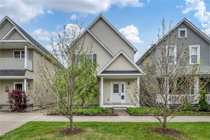 Welcome to 2239 W 20th Street—an exceptional opportunity located in the vibrant and desirable Duck Island neighborhood in Tremont just minutes from downtown Cleveland and the historic West Side Market. This move-in ready home features 2.5 bathrooms and a flexible layout, offering the perfect canvas for your personal touch. Inside, the second floor primary suite boasts an en suite bathroom complete with a spacious soaking tub.  Two additional bedrooms and full bathroom complete the second floor.  On the first floor you will find a large living room and half bathroom for convenience.  The dining room, located just off the open and spacious kitchen, is bathed in natural light from surrounding windows and glass doors that open to a stone patio—ideal for creating your own outdoor retreat. The property also includes mature landscaping, with established pawpaw trees in the tree lawn and a thriving fig tree in the backyard, adding both charm and sustainability.  The unfinished basement provides abundant potential—perfect for a home gym, playroom, or expansive storage.  A list of recent updates are available in the MLS supplements. This is a rare chance to own a home in a highly sought-after location—offering space, convenience, and the opportunity to make it your own.