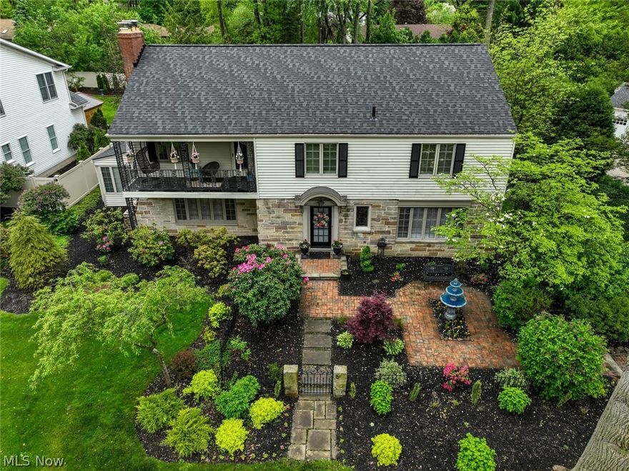 A rare and exquisite Colonial home in a highly sought-after street in Fairlawn Heights, this astonishing Franz-built home presents impeccable curb appeal and unrivaled amenities, with 3,060 sq. ft. of living space, 4 beds, and 4 baths. Take a stroll through the front courtyard or take an afternoon retreat to the tranquil Koi pond.  An entertainer's dream perfect for hosting guests in the eight-person American-made Viking Hot Tub covered by a cabana. Enjoy your morning coffee or tea out on the primary bedroom balcony.  This stunning home boasts many updates including 2021 KitchenAid appliances: gas cooktop, double wall convection ovens, and dishwasher. Hardwood floors throughout were resealed (2022),  majority refinished hardwood flooring (2022), new roof with leaf guard gutters (2020.) This gorgeous home offers 4 oversized bedrooms all with large walk-in closets. Three bedrooms have double walk-in closets. Ground-level private office with picture window overlooking the front courtyard.