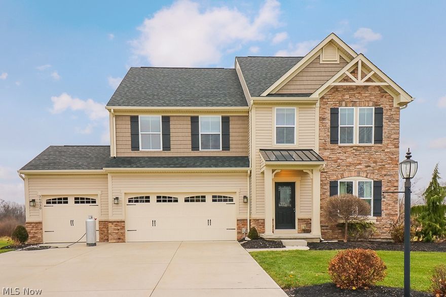 RARE OPPORTUNITY TO MAKE THE FORMER MODEL HOME WITH ALL OF ITS UPGRADES YOURS TODAY IN THE DESIRABLE HAMPTON ESTATES SUBDIVISION...Ready for immediate occupancy!! Be the first to see this 4 bedroom upgraded colonial with additional loft/rec space on the 2nd floor, 2nd floor laundry w/ washer & Dryer, premium kitchen w/stainless appliances included & the much sought after morning room, full finished basement w/additional half bath, 3 car garage and more. You will be impressed the moment that you pull into the large drive for additional parking & view the premium exterior along the raised deck that overlooks the open back yard. Enter to a professionally decorated model home w/gleaming hardwood floors, beautiful window treatments & and this will lead you to the stunning kitchen w/upgraded 42" cabinets, GRANITE COUNTERS, stainless appliances & all of this is light filled from the relaxing morning room that is full of windows...this open concept has the kitchen open to the huge family room