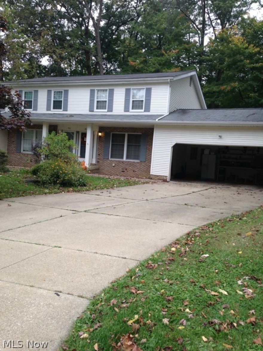 Sunny, spacious and newly remodeled townhome available in Stow! This fantastic unit has so much to offer!  It boasts a family room with a fireplace that opens to the remodeled eat in  kitchen, a formal dining room and living room, a 3 season room, and a half bath finish the first floor. Upstairs you will find a very large master bedroom with double closets and a roomy second bedroom as well as a newly updated full bathroom with a brand new tub surround.  The basement is partially finished and has plenty of room for storage.  The attached 2 car garage and wooded views off from your back patio just add to the many desirable features of this home.  Dont miss this one!