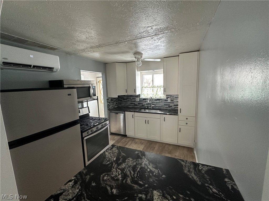 Photo of 29902 Euclid Avenue #B7, Wickliffe, OH 44092 (MLS # 5194429)