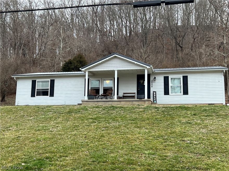 River view home sitting on 1.191 acres with 3 bedrooms and 2 bathrooms. Featuring new flooring throughout the entire home, new toilets in both bathrooms, new kitchen sink (2022). The appliances are only a year old. Enjoy the river view from the covered front porch or the side deck. Metal roof was installed in 2017. New siding has already been purchased all you have to do is put it on. Building is 16x24 built in 2017 with a metal roof.