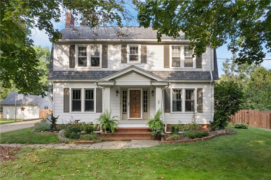 Enjoy timeless elegance in this charming Dutch Colonial located on almost a half acre in the heart of Orrville. This inviting 3 bedroom, 1 1/2 bath home boasts over 1700 sqft. The welcoming foyer leads to a spacious dining room and a generously sized living room featuring a brick fireplace. The kitchen has newer appliances, shaker cupboards and is ideally situated with a door that leads outside to a smaller deck perfect for BBQ grilling. You’ll also find a walk-in pantry and newer flooring. Upstairs houses all 3 bedrooms with walk-in closets, a large primary full bath with built-in storage cupboards, a small bonus area and access to the stairway to the unfinished attic. The basement has been previously waterproofed, has a half bath, a large fruit cellar, and plenty of storage. There’s a lovely 18 x 10 screened in porch and a newer deck (2023) that overlook the fenced in park-like backyard. Not 1, not 2, but 3 car garage spaces. Close to shopping, restaurants, recreation, and medical facilities. Don't miss out on this prime opportunity to call this home!