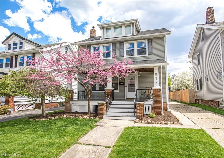 Welcome to 2161 Richland Avenue! This Lakewood colonial is bursting with updates, and within walking distance of shopping, dining, and more! Step inside from the wide front porch to a living room with charming original built-ins, a modern ceiling fan, and lots of natural light. The dining room is perfect for hosting family and friends with sightlines to both the living room and kitchen. The kitchen features new flooring, a tiled backsplash, new stainless appliances (2017), and access to a mudroom that walks out to the patio and backyard. Upstairs, three large bedrooms await with new carpet throughout the upper level. A bonus room has been converted into a walk-in closet for added storage and organization. A full bathroom completes the second floor. The unfinished attic can become additional living space, just waiting for your finishing touches! The basement offers a laundry area with washer and dryer that stay, as well as an additional full bathroom and workshop area. Outside, enjoy th