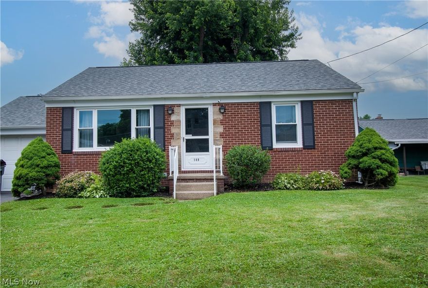 This adorable brick ranch home has been updated in all the right areas. Well-maintained, bright & airy with modern colors, a new roof, and a lot to offer. Spacious living room with laminate flooring and a large picture window. A lovely eat-in kitchen with white cabinets accented with beautiful tile backsplash and butcher block countertops, a breakfast bar, stove/refrigerator, and a dinette area. Two bedrooms, a full bath (with Wainscoting accent walls-shower/tub combo-built-in drawer/linen closet), and a walk-up attic (in between living room & kitchen) complete the main floor. The basement is dry and clean (perfect for transforming into a recreation area); it offers two finished rooms for an office, exercise, craft room, or anything you desire, and a laundry area with a standing shower. -Attached one-car garage with backdoor access to the fenced-in backyard, a large concrete patio (excellent for gatherings & entertaining), and a shed for extra storage. Tucked in a neighborhood with a s