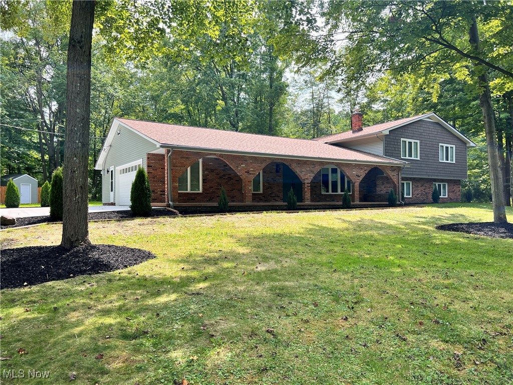 Completely Remodeled Gem in the Heart of Mayfield Village!
Welcome to this stunning 4-bedroom, 3.5-bathroom split-level home, thoughtfully renovated from top to bottom and perfectly situated in desirable Mayfield Village. Step inside to discover an open-concept layout that seamlessly connects the brand-new kitchen, living room, and family room—ideal for both everyday living and entertaining.
The main level boasts gleaming new hardwood floors and a bright, modern kitchen that flows into the dining area, which opens to a spacious deck overlooking over an acre of beautifully maintained backyard space. The master suite is a true retreat, featuring walk-in closets with custom built-ins and a luxurious en-suite bathroom with a sleek, modern shower.
The lower level offers a cozy family room centered around a large fireplace, along with a private bedroom and full bath—perfect for guests or in-laws. Enjoy quiet mornings on the charming front porch with arched details and take in the curb appeal enhanced by all-new landscaping.
Located just minutes from top-rated Mayfield schools, shopping, Hillcrest Hospital, and the scenic Metroparks, this move-in ready home offers the perfect blend of style, space, and convenience.