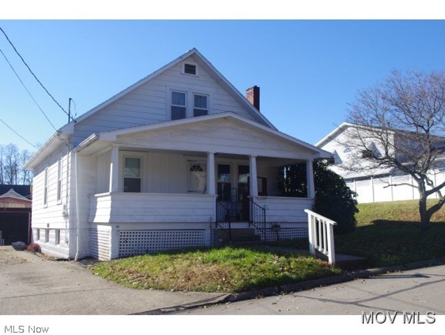 Double lot with alley access, 4th room upstairs could be bedroom, covered carport & detached garage. HVAC system & roof in 2011. Hardwood floors under carpet.  Elem: Neale Elementary  Elem/Bus: N  JrHigh: Jackson Jr. High School  JrHigh/Bus: N  High: Parkersburg High  High/Bus: Y  Fire: CIT  Police: CTY  ;SQFT=Fin L1:1474, Fin Above:1474, Fin Total:1474, Unfin Bsmt:496, Unfin Above:496;GAR= 1 Car Carport, 1 Car Det