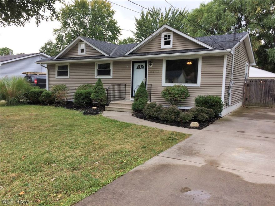 Cute 3 bedroom ranch just remodeled bath and recently remodeled kitchen.  The appeal of this home pulls you in from the street with its recently sided and manicured landscaping. The home is freshly painted throughout with a grey color palette and hardware floors in the living and bed rooms.  Large eat-n kitchen with ceramic tile floor, newer kitchen cabinets and a dishwasher.  Rear door flows off to a covered patio (11 X 18) with a completely fenced in backyard. Bath was just remodeled.  Full basement (38 X 25) with newer furnace, air-conditioning, roof and windows.  Two car garage. Comes with a l year home warranty. Set up a private showing today, we know you'll like it here!