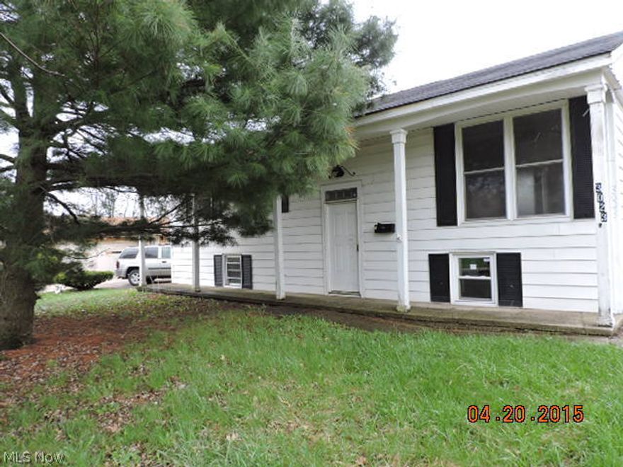 Spacious aluminum sided bi level has potential for additional living space in lower level. Front entry foyer with traditional upper level living areas with living room, dining area, kitchen, 3 bedrooms and bath. Walk out lower level is divided into 3 rooms but does require foundation repairs. Attached garage, partially fenced yard and concrete drive.