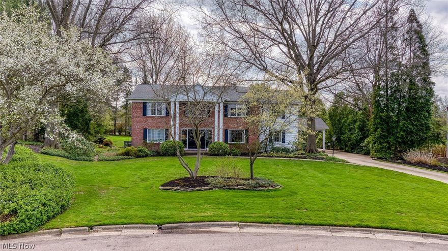 Welcome to your dream home, a stunning colonial nestled at the end of a quiet cul-de-sac in West Akron, with a backyard that seamlessly adjoins to Portage Country Club. This remarkable property spans just over an acre, showcasing breathtaking grounds and beautifully landscaped gardens. As you step into the foyer, you’ll be welcomed by an elegant curved staircase and an abundance of crown molding, emphasizing the home's unique charm.
Descend into the refined formal living room, featuring hand-laid parquet floors, intricate crown molding, and large windows that flood the space with natural light. Access the patio through doors that lead to the picturesque backyard.
The kitchen and den create a warm, open area ideal for gatherings. It comes fully equipped with a Sub-Zero refrigerator, a range, warming drawers, and a dishwasher—all included with the home. A cozy dinette off the kitchen serves as the perfect spot for enjoying your morning coffee. The four seasons room, complete with an additional kitchenette, offers extra space for food preparation during entertaining.
The first level also features an office and a dining room, rounding out this exceptional living space.
Ascend to find the master bedroom, which includes a spacious walk-in closet that any fashionista would cherish. The bathroom is equipped with a walk-in shower, a luxurious soaking tub, and a vanity area perfect for your morning routine. One bedroom features two built-in full beds along with bookcases and a desk, while the third bedroom includes a built-in daybed—ideal for guests. All bedrooms are generously sized.
The basement is completely remodeled, featuring a brand-new sump pump, and the pool table will stay. The roof was replaced in 2021.