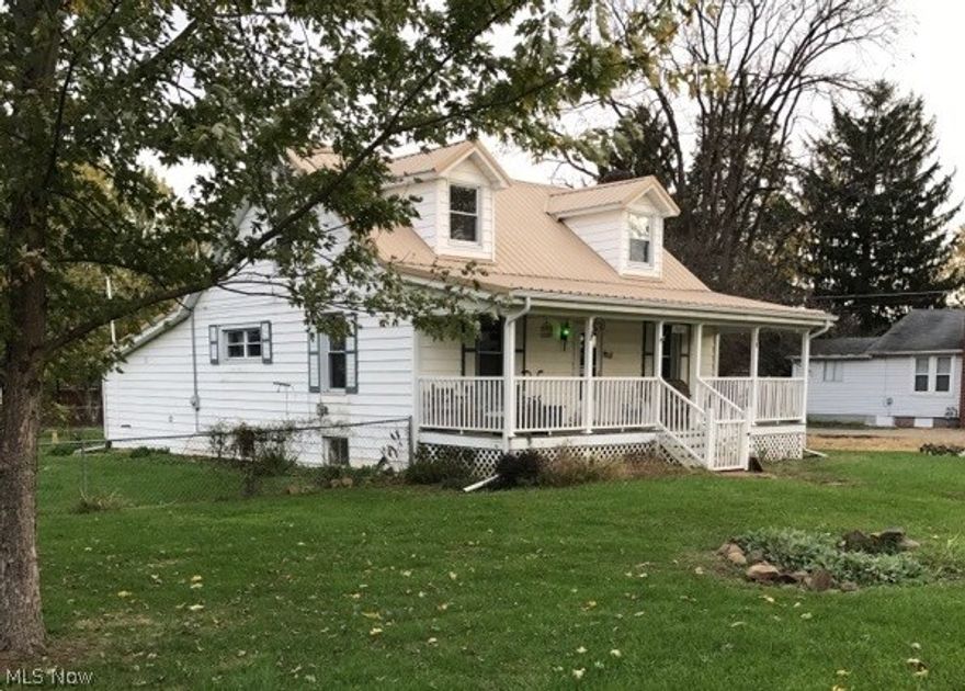 This cape cod offers 4 bedroom large master suite , 1/2 acre with chain link fencing  , offers a large 36 x 30 pole building  , second shower in basement