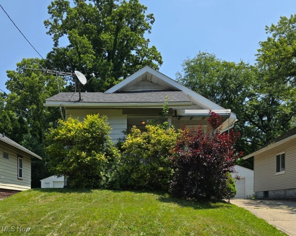 Investor Special in Akron! This 2-bedroom, 1-bathroom home is packed with potential and waiting for your vision. Nestled on a quiet street in Akron, this property features a detached 1-car garage and a manageable yard—perfect for renters or first-time buyers. With some cosmetic updates and TLC, this could be a great flip or long-term rental. Solid bones and a functional layout make this a smart investment in an up-and-coming area. Bring your toolbelt and imagination—opportunity knocks!