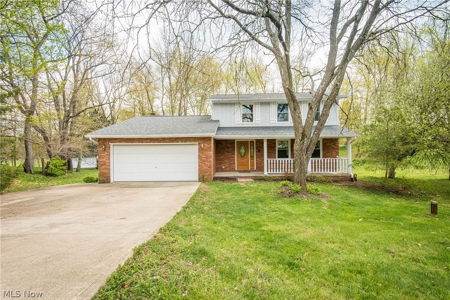 Private cul-de-sac, spacious 3 bedroom 2 bath home, Lake Schools! BRAND NEW ROOF April 2020 along with new windows in living room, dining room and bedroom.   Living and dining rooms with hard surface flooring, and you will love the bright and cheery eat-in kitchen with new stainless appliances and lots a cupboard space. Convenient 1st floor full bath and spacious family room with hard surfaced floors and wood burning fireplace.  Beautiful views from the family room doors to the deck, gazebo and spacious backyard with large garden shed.   2nd floor has 3 bedrooms and a full bath.  Finished room in the lower level is great for everyday or entertaining. First floor has doors with beautiful leaded glass - really nice!  Large covered front porch with more great views.  2 car attached garage and oversized concrete drive.  Come see for yourself! Well and septic inspection already completed too!