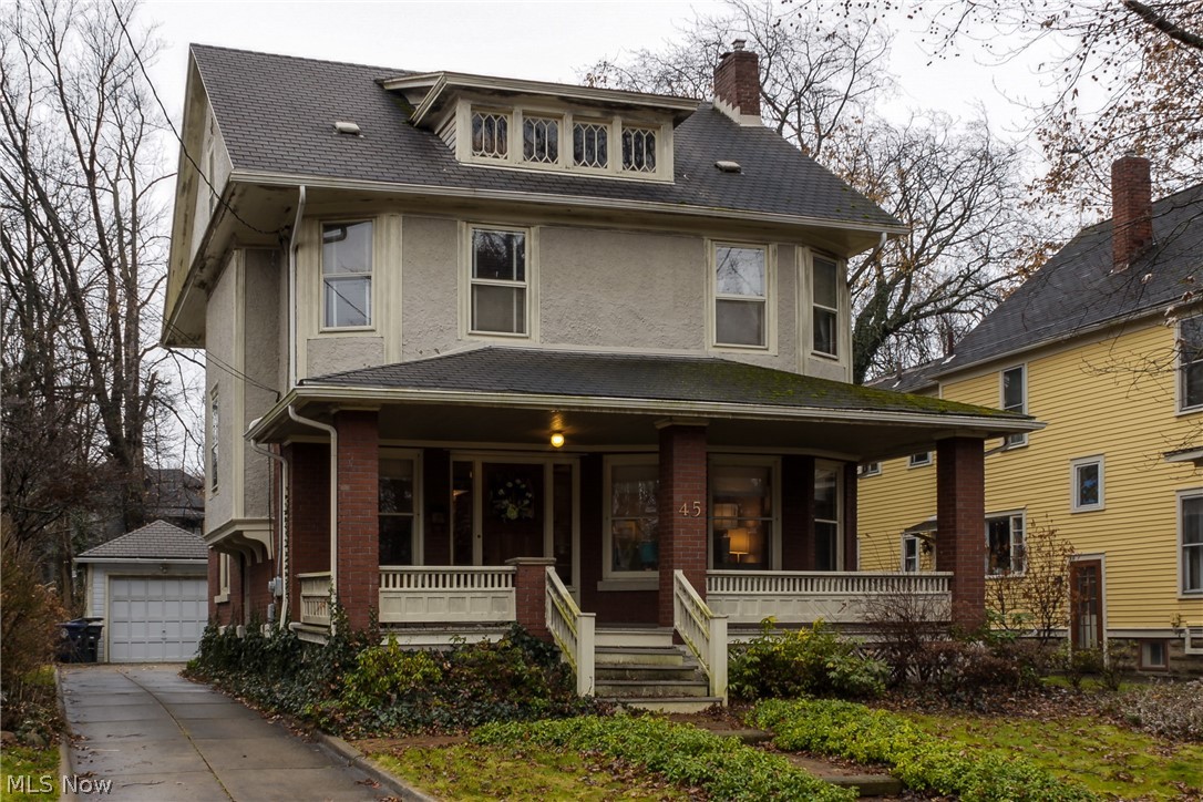 Stunning home available on one of the most sought after streets in West Akron. Welcome home to 45 Mayfield Ave. This remarkably cared for home boasts exceptional woodwork and details throughout. Enter through the grand foyer with built ins and gleaming natural wood moulding perfect for a reading nook or or desk. Large living room offers plenty of space for multiple seating areas. Large eat in kitchen with custom cabinets and counters, newer stainless steel dishwasher and a high end Wolf range. Enough room in the kitchen to add a butcher block island. Lighting throughout carefully chosen to reflect the style and period of the home. The meticulous detail is carried upstairs, where you will find an enormous full bath with attention to period style, including a clawfoot tub, a beautiful pedestal sink and separate shower. 3 bright and sunny bedrooms offer very nice closet space. The main hall has a deep cedar closet well. The walk up 3rd floor is currently used as expansive storage