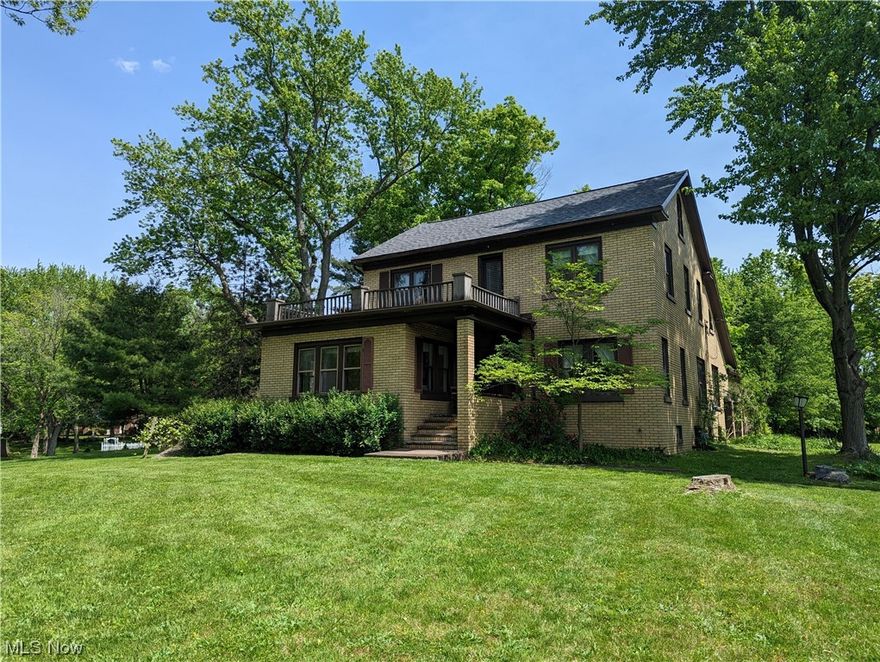 A remarkable home with seclusion and charm on just over 5 acres in Nimishillen Township!  This brick two story sits back off of Columbus Road in a peaceful setting.  Surrounded by nature, home offers plenty of living space!  Enjoy morning coffee with breathtaking views in the sun room or from the kitchen!  Tons of light captured in the large living room!  First floor includes not only plenty of living space but also a bedroom, with adjoining study and a full bath.  Upstairs there is so much space along with 3 bedrooms and loads of closets and storage.  Second floor you will find access to the bonus room above the garage and a second set of stairs to the main floor.  Third floor is a huge attic with tons of potential!  There is an oversized attached garage with workshop / storage area.  Outside you will find so much to enjoy from the enchanting yard to the pond, enjoy all seasons here.  This is a must see!  Call today for a tour!