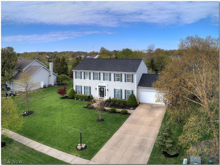 This Exceptional Home Has Been Completely & Totally Remodeled/Updated With Only The Finest Of Materials & Modern Colors Throughout While Being Situated In A Very Desirable Neighborhood & A Top Rated/Desirable City...A delight from start to finish with a private backyard w/a perfect raised for for summer relaxing & entertaining! Classic front colonial w/NEW ROOF & other updates, situated on a premium private lot w/partial wood privacy fence, some trees & large enough raised deck for large gathings. Enter to a wood floored foyer & you will see the beautiful updates! Gorgeous & Gourmet white kitchen that includes a large chef's island (Added trim detail) w/premium quartz counters added, appliances included, refinished wood floors, pantry & all of this overlooks the much sought after (Light filled) morning room...Formal dining for large gatherings...Kitchen is open to the large family room that boasts of transom windows for added natural light...Perfect gathering area for entertaining! 1st