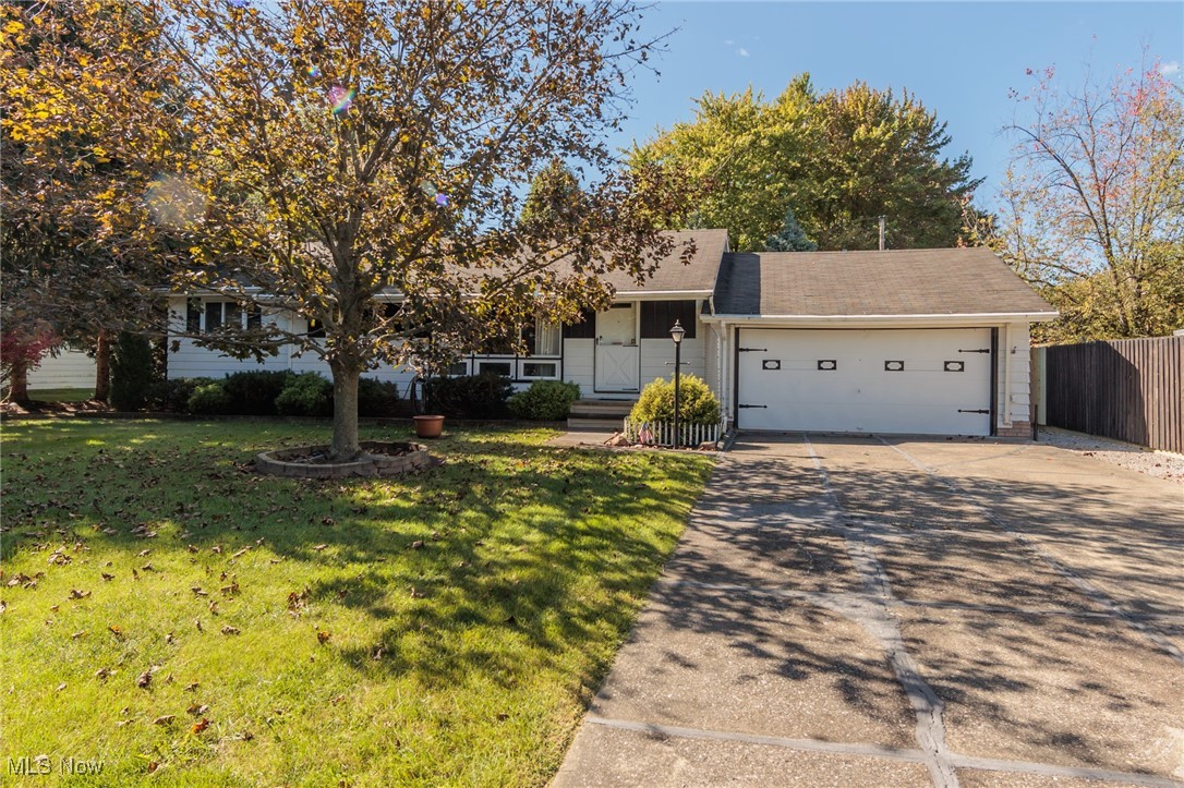 Welcome to this charming 3 bedroom Ranch located on a lovely property in Strongsville! This well-cared-for home is ready for someone to make it their own, whether you're looking to downsize or purchase your first home. The spacious living room flows into an inviting eat-in kitchen with a generous dining area, white cabinetry, plenty of counter space, a stylish backsplash, and included appliances. Three comfortable bedrooms include a master with convenient access to the full bathroom. You'll find even more living space in the expansive finished basement, featuring a large recreation area, bar, abundant storage, and a laundry room. Enjoy relaxing in the cozy 4-season room with a wall of windows overlooking the private, fenced backyard with a storage shed. The roof was replaced in 2011, and a 1-year home warranty is included for peace of mind. Located close to all the great amenities Strongsville has to offer. Call today and explore the potential this home has to offer!