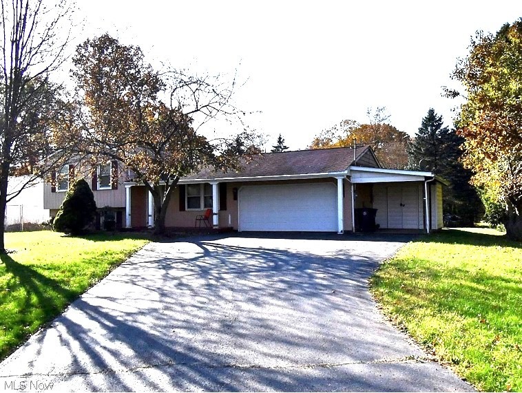 Charming split level on a spacious corner lot located in the heart of Champion Township. This three bedroom, two full bath home is move in ready! Close to shopping centers, dining and entertainment.