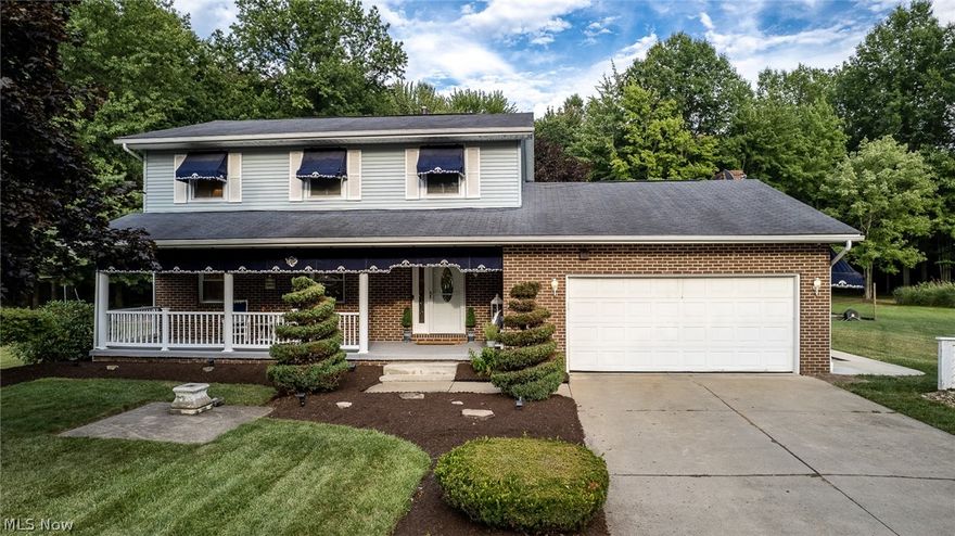 You will fall in love with this well-maintained home and the 1.038 acres it sits on. The main floor features generous sized family, living, and dining rooms plus an eat in kitchen with cherry oak cabinetry and patio doors leading to a spacious 2 level, 3 season room where memories will be created. Upstairs you will find the primary bedroom with en-suite and ample closet space.  Upstairs there are 2 additional bedrooms and another full bath. The lower level is finished with a granite wet bar that has counter height seating and gas fireplace. You might use this as a media room, office, or multigenerational suite The lower level includes a 4th bedroom and a ¾ bathroom and laundry.  The backyard is your own personal paradise.  Sit on the deck and watch the deer, swim in the above ground pool or sun on the pool deck.  At night, light the firepit and enjoy the peace and serenity of nature surrounding you.  In addition to the shed for your lawn equipment, you will find a 24 x 44 outbuilding accessible by a 2nd concrete driveway;  large enough to park 3 cars, bikes or recreational vehicles. Start packing, you just found a bit of paradise.