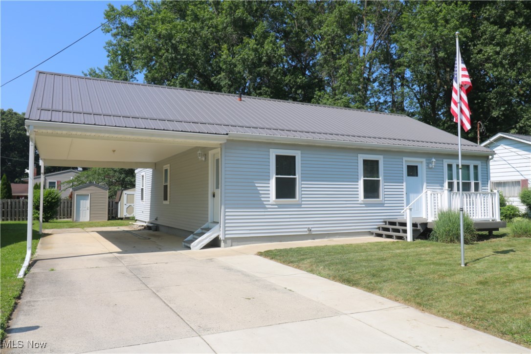 This beautifully updated 4-bedroom, 2-bath ranch offers the perfect blend of comfort and modern living...all on one floor! A few of the quality renovations completed in 2020 include a new furnace, AC coil, energy-efficient windows, granite countertops, roof, and hot water tank. As well as, the excavation and professional repair of three walls in basement, providing added peace of mind!
Enjoy the spacious open floor plan that includes a breakfast bar in the kitchen, flowing seamlessly into a large living room. The primary suite features its own bath with a walk-in shower, and the convenience of a main-floor laundry room adds to the home's appeal. Additional highlights include a Generac generator (installed in 2022), French drains, and a new maintenance free, welcoming front porch! Conveniently located within walking distance from shops, restaurants, rec center, and the trail head to Sofios Park!
