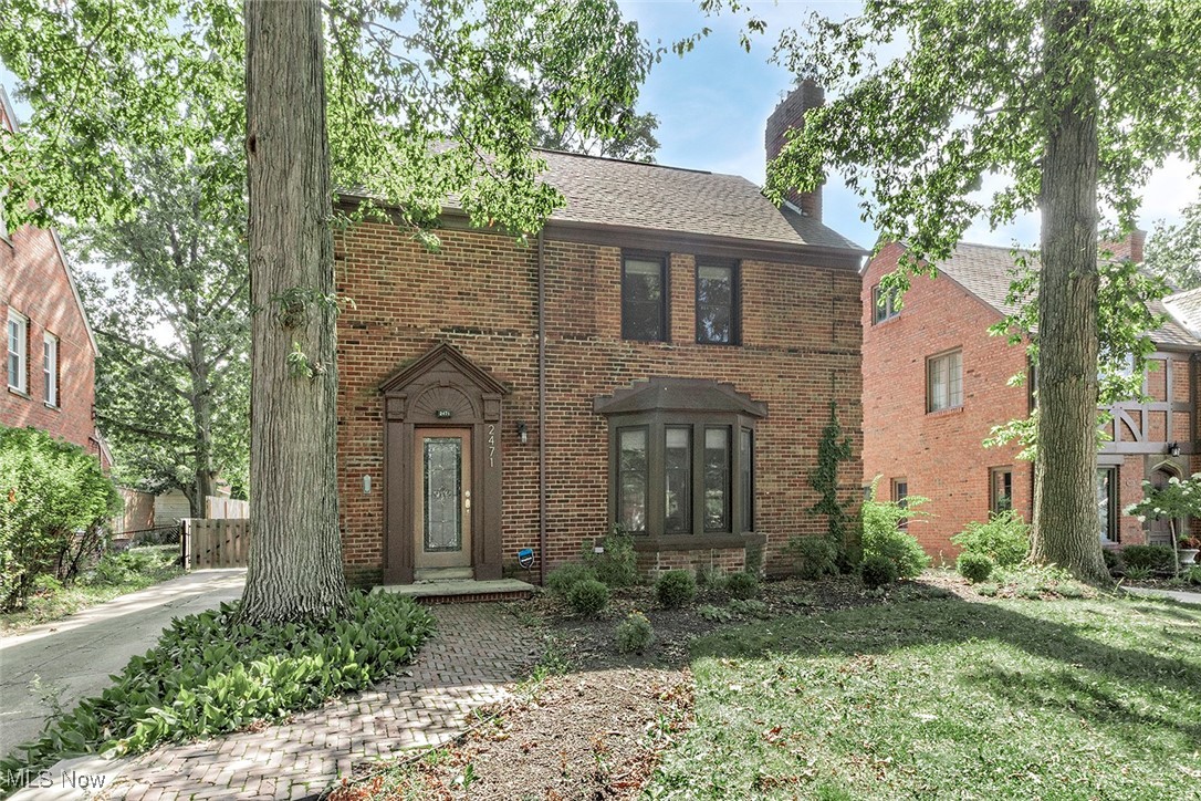 Welcome to 2471 Charney Road—a beautifully remodeled brick Colonial in the heart of University Heights. This home has been lovingly updated with stylish and thoughtful touches to enhance both form and function. Step into the elegant, updated kitchen, featuring stunning quartz countertops, crisp white cabinetry, stainless steel appliances, and rich hardwood floors. A custom-crafted pantry door adds a unique touch of character. The formal dining room provides an inviting space for entertaining, while the spacious living room boasts a large bay window, fabulous crown molding, and beautiful wood flooring. Off the dining room, the mudroom has been transformed with new flooring and striking barn doors, creating a contemporary yet cozy space for relaxing or working from home. Upstairs, the primary suite is a true retreat. The renovated en-suite bath includes a walk-in shower with beautiful tile, a newer vanity, dressing table, and updated flooring. The large third-floor bedroom suite features its own full bathroom. The lower level includes a partially finished family room, perfect for a playroom, home gym, or rec room. Step outside to your backyard oasis, complete with a covered patio, stone walkway, fire pit, and thoughtfully designed landscaping—perfect for relaxing or entertaining in all seasons. This home combines classic architecture with modern conveniences—truly move-in ready. New concrete recently poured for most of the driveway. Point of sale compliant. Don’t miss your opportunity to own this beautifully updated gem on one of the most desirable streets in University Heights!