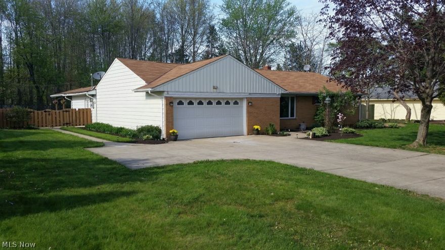 Casual elegance best describes this remodeled ranch in Brecksville. An open floor plan is highlighted by the 2004 great room addition featuring new stone fireplace, large bay window and plenty of storage. The 2014 kitchen boasts new cabinets, granite counters, laminate flooring, newer appliances, breakfast bar, pantry and a casual dining area.  Buyers will love the custom designed, two person shower featured in the remodeled master bath. New flooring throughout the home compliments the warm and welcoming décor. Arched entries, contemporary lighting, and large room sizes add to the homes appeal. The fenced yard is perfect for entertaining – a covered patio off the great room, a second patio leading to the front drive and large fire pit are enjoyed spring through fall. Additional improvements in the past ten years include windows, roof and expanded driveway. Located south of downtown Brecksville and close to the Metro Parks this is a rare find.