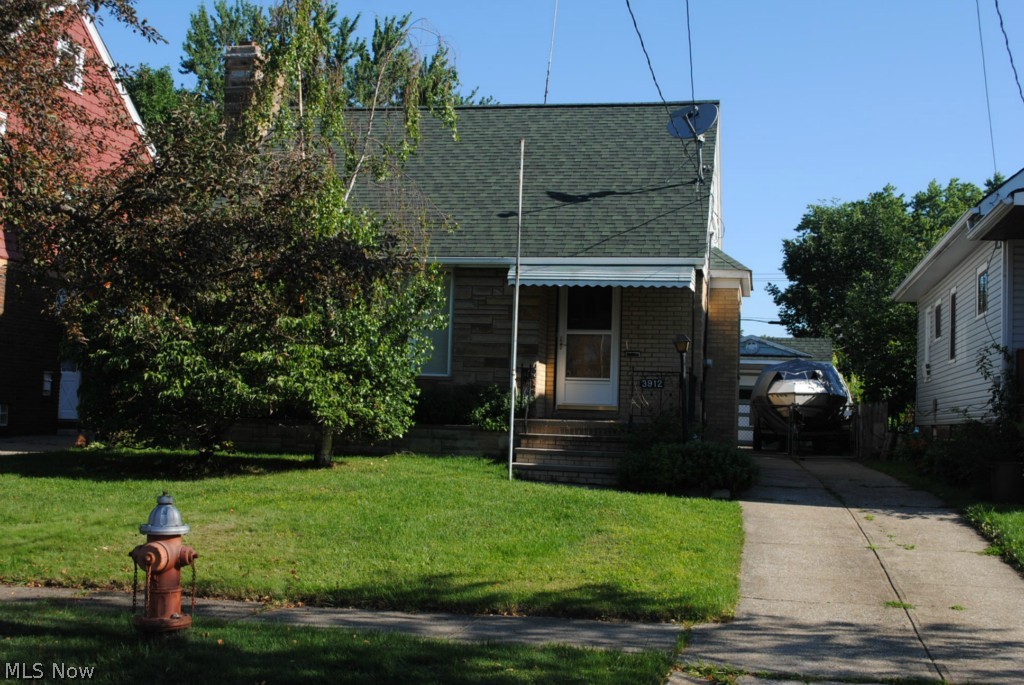 ESTATE SALE .... Large Four Bedroom Brick Bungalow .... 2 Bedrooms Down Plus 2 More Upstairs .... 2 Full Baths .... Full Basement .... Cozy Living Room With Fireplace ... Newer Furnace And Central Air .... Newer Roof .... Some Newer Windows .... Hardwood Floors .... Needs TLC .... Very Desirable Street ....
