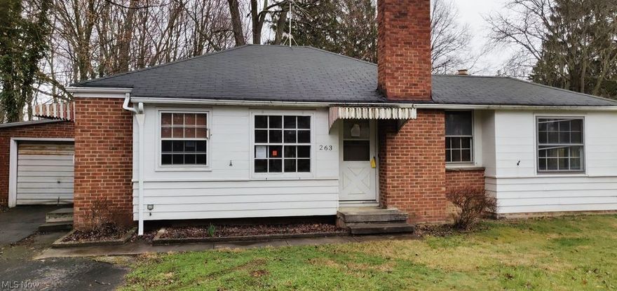 Quaint 3 bedroom ranch with plenty of potential, attached garage, full basement, wood floors and more!