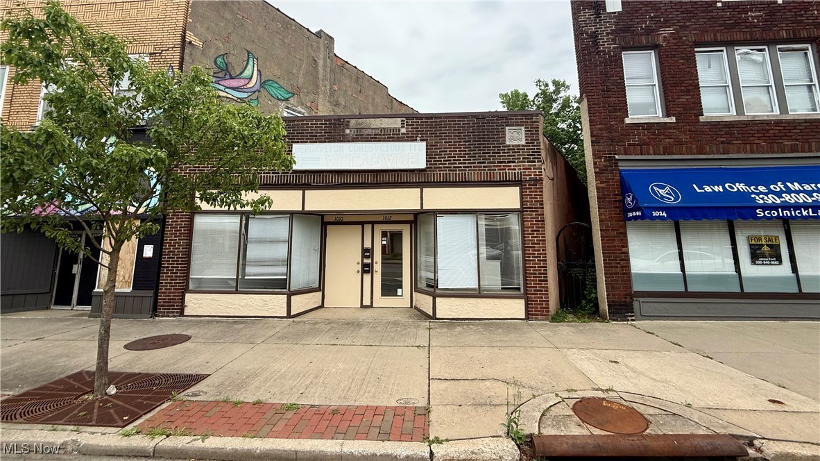 Prime Kenmore Blvd Commercial Opportunity. Located in the heart of Kenmore Blvd's historic district and within a designated Opportunity Zone, this versatile commercial property presents a rare chance for investors and entrepreneurs alike. With tons of potential and endless possibilities, this space is ideal for office use, retail, or even a creative mixed-use conversion. The building features a flexible layout with multiple rooms that can remain as-is or be opened up to suit your vision. It includes one full bathroom and a half bath, a back storage room with private rear access, and a small kitchen area tucked in the rear perfect for staff or tenant convenience. While the property does need some updates, it?s a solid investment opportunity in a rapidly revitalizing corridor. Don't miss your chance to own a piece of Kenmore Blvd's future!