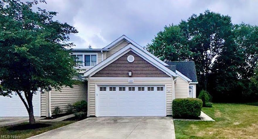 Move right into this beautiful, fully renovated end-unit condo. This lovely 2-bedroom, 2-full bathroom Ranch style home is truly one-floor living at its best! The large great room includes beautifully vaulted ceilings, freshly painted walls, and newer hardwood oak floors. This space is open to a dining room and a newly renovated modern kitchen with a breakfast bar, a new tile backsplash, new countertops, a new sink, and brand new stainless steel appliances (all appliances will remain). Along with the new kitchen, some of the many improvements in the last year include a new furnace, fresh paint throughout, updated bathrooms, custom shades, new ceiling fans throughout, and updated lighting. The master bedroom has an ensuite full bath, a vaulted ceiling, and a large walk-in closet with custom built-ins. The LARGE full basement is a blank slate awaiting your finishing touches. Outside, you will find a large private deck with wooded views. The 2-car attached garage is spacious and has water and electricity. The first-floor laundry completes the one-floor living; the washer and dryer will remain. Greenwood amenities include both indoor and outdoor pools, an exercise room, tennis courts, a community room, and more. You are steps from the Cuyahoga Valley National Park, Brecksville Reservation, and the Akron Hike and Bike Trails.