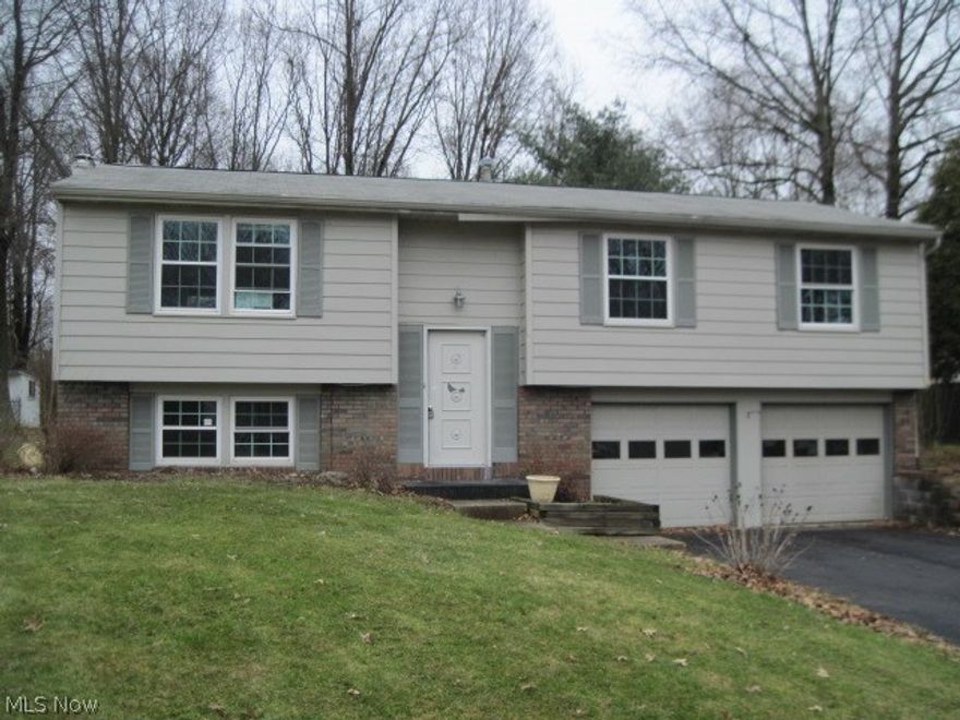 This 3 bedroom bi-level home has 2 full bathrooms. The master bedroom has a full master bathroom. There is a 2 car attached garage. Family room has a wood burning fireplace. Howland Schools! This property is Sold As Is Condition. Hud case #412-734057.