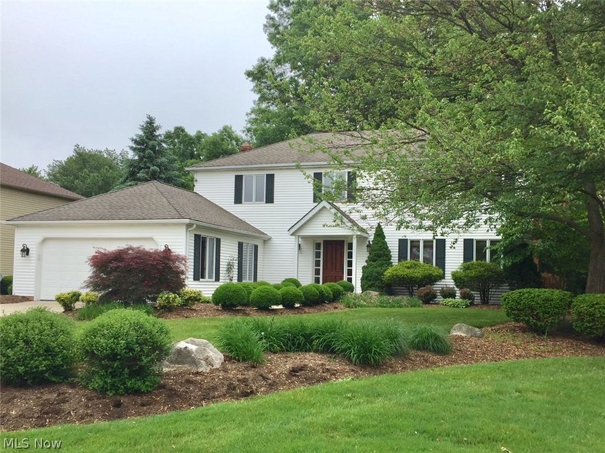 Gorgeous 4 bedroom colonial home in desirable Settlers Reserve neighborhood! Welcoming foyer has ceramic tile flooring and a newer front door. Remodeled eat-in kitchen features hardwood flooring, granite counters, stainless steel appliances, and tile back splash. Formal dining room off the kitchen opens to the living room and makes for easy entertaining. Family room features a gas fireplace with brick surround, wet bar, and sliding glass doors to access the back patio. Half bath and laundry room with washer and dryer round out the first floor. On the second floor is the master bedroom with a walk-in closet and private master bath, as well as three additional bedrooms with the second updated full bathroom. Partial basement is finished with a large recreation room and office area. Concrete patio in back yard is newer and a great place to enjoy the warmer weather! Call today for your private tour!