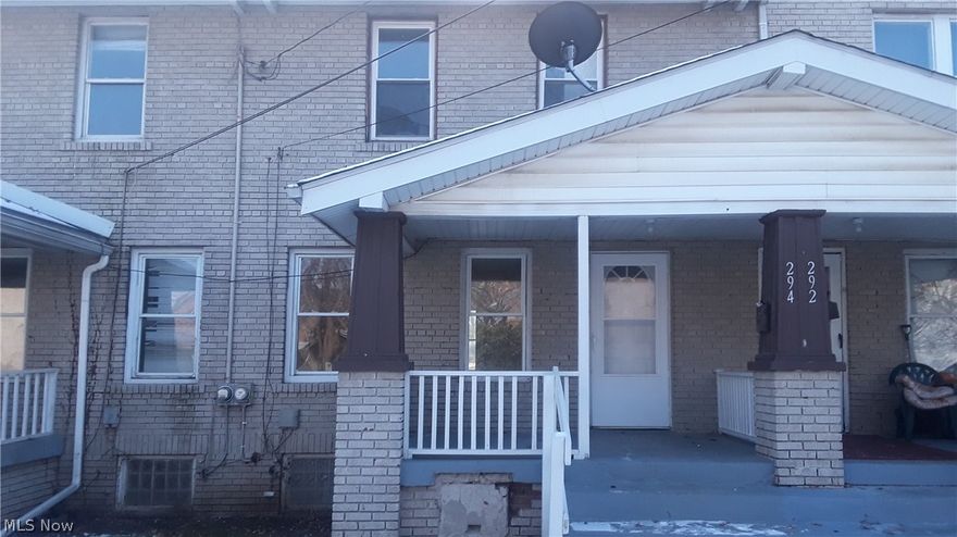 Spacious large garden style apartments set up like townhomes. Each unit has large covered front porch, spacious living and dining area, kitchen equipped with refrigerator and stove. Two large bedrooms upstairs. Full bath is on second level. Each apartment is decorated in neutral décor. Unfinished large basement with laundry hook up. Plenty of off street parking available. Professionally managed. Application fee will be online with a $35 cost per adult. No pets!