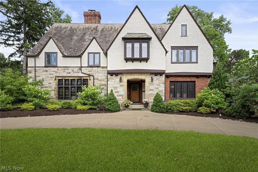 The winner of Cleveland's 2015 Outstanding Residential Preservation Award, this 1931 Chester Lowe-designed Tudor was impeccably renovated down to the studs, preserving its historic workmanship while creating a luxurious and sustainable home. Original historic details were restored including parquet floors, leaded windows, and crown molding. The luxurious kitchen features Fisher & Paykel™ and Miele™ appliances. A spacious primary suite is a spa oasis with large closets, steam shower, heated floors and a fireplace. This 5,000 sq. ft.+ home also benefits from a geothermal retrofit, reducing heating and cooling costs to those of a home half its size. Equipped with 400 amp service, new plumbing, electric and mechanical systems, it is one of the greenest and most efficient large homes in the region. Centrally located to exceptional public and private schools, Shaker Country Club, Downtown Cleveland and the region’s premiere cultural, medical and educational institutions, 18550 S. Woodland is