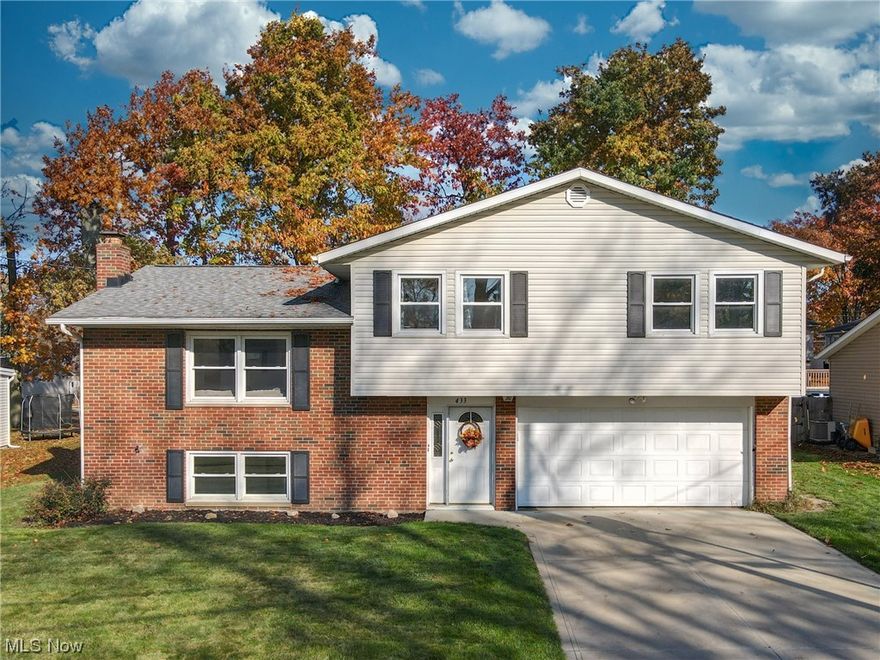 Welcome to this charming split level home located in Tallmadge City Schools district. With 4 spacious bedrooms and 1.5 bathrooms, this home offers plenty of room. The owners have made thoughtful renovations, including removing a wall between the kitchen and dining room. This has created a generous amount of space, allowing for the addition of an island while still leaving room for a dining room table. Off of the kitchen the home also features a 3 seasons room, providing a peaceful retreat overlooking the backyard and patio. There are two living areas in this home, providing ample space for relaxation and entertainment. The main level living area offers a comfortable space, while the lower level features a stunning stone fireplace that adds warmth and charm. Under the carpet in the living room and bedrooms, you'll find hardwood floors waiting to be uncovered and restored to their original beauty. Don't miss out on the opportunity to call this house your home. Contact us today to schedule a showing and see all that it has to offer.