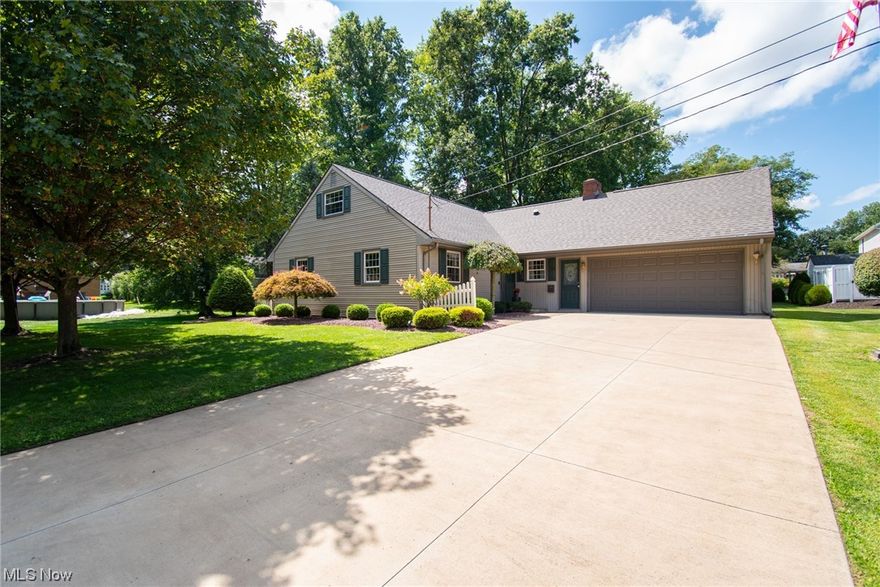 Take a walk through this impeccably maintained 4 bedroom, 3 full bathroom bungalow in Columbiana schools and fall in love. Located on a quiet street, just steps away from Firestone park. this spacious home is everything you have been searching for. On the main level you will find a beautiful kitchen with newer stainless appliances, multiple living spaces, two bedrooms, 2 full bathrooms and as an added bonus, a fully enclosed 4 seasons room perfect for year round indoor/outdoor living. Upstairs you will find two additional bedrooms, another full bath and 3 flex rooms that could be utilized for a multitude of creative uses. Currently they are being showcased as individual libraries for the children.   With 14 closets throughout the home, a full basement and an abundance of kitchen cabinets, you will never lack for storage space. Whether you are just starting out, looking for some space to grow, busting at the seems in your current home, or looking for single floor living as you downsize, this could be the perfect next home for you. Recent updates include: roof (23), fridge (23), HWT (21) and newer windows. Call your favorite agent today to schedule a private tour. ***Brand new electric panel & dishwasher  (24)***