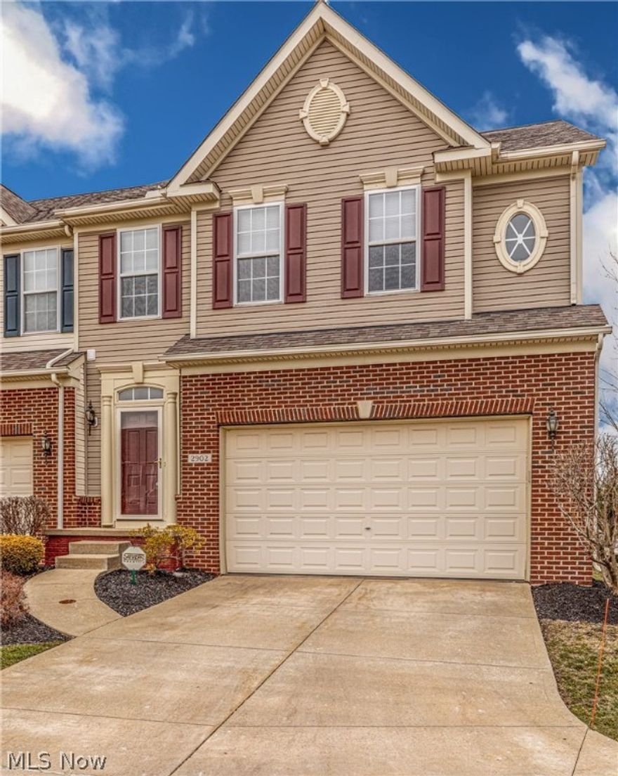 Stunning townhome in desirable Willoughby Hills!  This home features numerous high-end updates from the moment you walk in the front door!  The inviting foyer has updated tile flooring and vaulted ceilings!  Spoil yourself with this AMAZING kitchen with beautiful cherry cabinetry, granite countertops, tiled backsplash, stainless steel appliances, a breakfast bar, butler's pantry and tile flooring!  Gather around the gas fireplace in the living room which has gorgeous hardwood flooring that runs into the full-sized dining room with tons of natural light!  Right off the kitchen and dining room is a large deck, perfect for summer BBQs!  The kitchen, living room and dining room are all very open and great for entertaining!  The extra-large master bedroom has his and her walk-in closets, halo lighting and a spacious sitting area!  The master bathroom has double sinks along with a jacuzzi jet tub.  There are also two other spacious bedrooms and a full bathroom, along with convenient second l