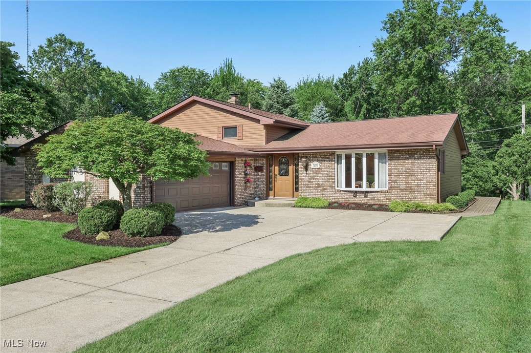 Welcome to this beautifully maintained home in Parma, offering a sprawling and thoughtfully designed layout with exceptional custom-milled woodwork, solid oak interior doors, and quality finishes throughout. From the moment you step into the large entry, you'll appreciate the craftsmanship and attention to detail.
Entertain guests in the spacious living room with crown molding or host dinner parties in the elegant dining room, highlighted with crown and chair molding.
Prepare delicious meals in the eat-in kitchen, completely remodeled in approximately 2010, which is equipped with granite countertops, all appliances, solid cherry cabinetry, ceramic tiles, and a large bay window.
Step into a vaulted sunroom filled with windows, allowing panoramic views of the tranquil backyard. The sunroom also features tile flooring, a decorative stone wall, a gas fireplace, and direct outdoor access—perfect for relaxing year-round!
Upstairs, you’ll find three comfortable bedrooms and a full bathroom with granite counters and double sinks.
The lower level includes an engaging family room, additional storage, a full bathroom with a granite countertop, and a laundry room with ample cabinetry.
A brick sidewalk leads to multiple brick patios overlooking a well-manicured, .21-acre lot with a  serene, wooded backdrop.
Additional highlights include an attached 2-car garage and location within the Parma School District. This home is walking distance to the elementary school, as well as the Dentzler Trailhead trail - which connects to 4 other trails!
Major updates to the home include newer kynar vinyl siding, roof, and Anderson windows, a hot water tank (2017), air-conditioning and furnace (both in 2021)!
This home blends charm, functionality, and outdoor living—schedule your showing today!