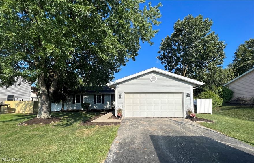 Dream a little dream right here in Stow Ohio with this spacious ranch. This 1800+ sq foot home offers  4 bedrooms and 2 full bathrooms.  It also features a large living room and kitchen with custom trim and cabinets.The entire house has been re painted and carpeted and is move in ready.  The master bedroom offers a  full private bath. The lower level has a huge 30x30 rec room which is perfect for another entertainment area. This one won't last long, set up your private showing today.