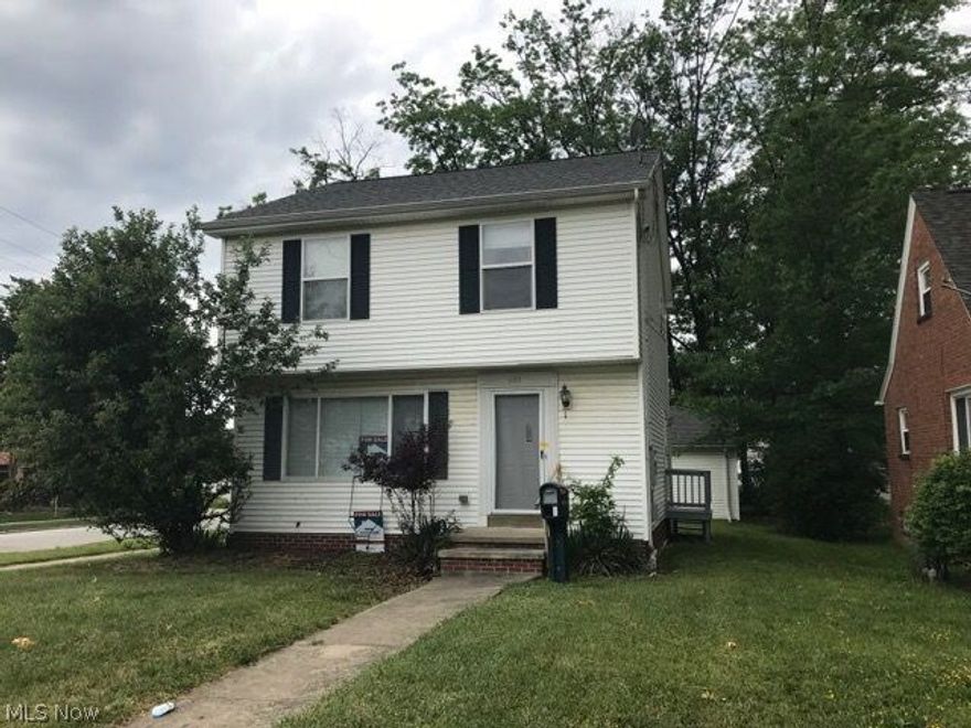 Three bedrooms, one full and a half bath, partial basement  and detached garage/storage are some of what you will find here. There are enhancements needed to get this home move in ready. Local amenities include shops and restaurants. Take a look today, see what you can accomplish here.