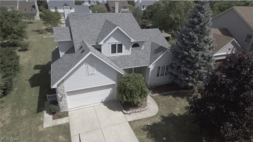 Quality Amherst Schools! Your DREAM HOME awaits with curb appeal from attractive roof lines, partial stone front and relaxing front porch while being situated on a very quiet cul de sac street and spectacular lot that boast of a raised custom deck for entertaining! Enter to a soaring 2 story foyer and side staircase for that dramatic touch. Room for everyone w/spacious family room that includes a stone fireplace for those romantic evening that can be viewed from the upgraded kitchen that includes appliances along w/bayed out dinette (Pantry for storage)! Formal dining for holiday gatherings along with a light filled vaulted living room. Closed off 1st floor laundry completes this level. Exciting owner's suite with cake ceiling, ample walk in closet space along w/a glamour style bath that includes dual sinks & oversized soaking tub to pamper yourself with. Full basement awaits your finishing touches! Sharp home that is easy to show and located with easy access to highways, shopping, etc